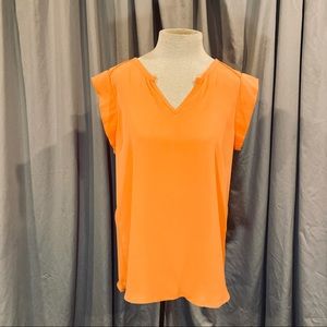 Takara orange blouse. Size M. Front length 25”. Back length 30”.